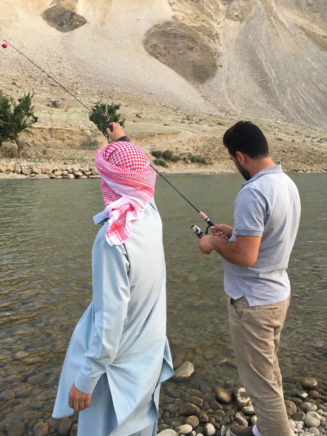 People fishing in Panjshir Valley