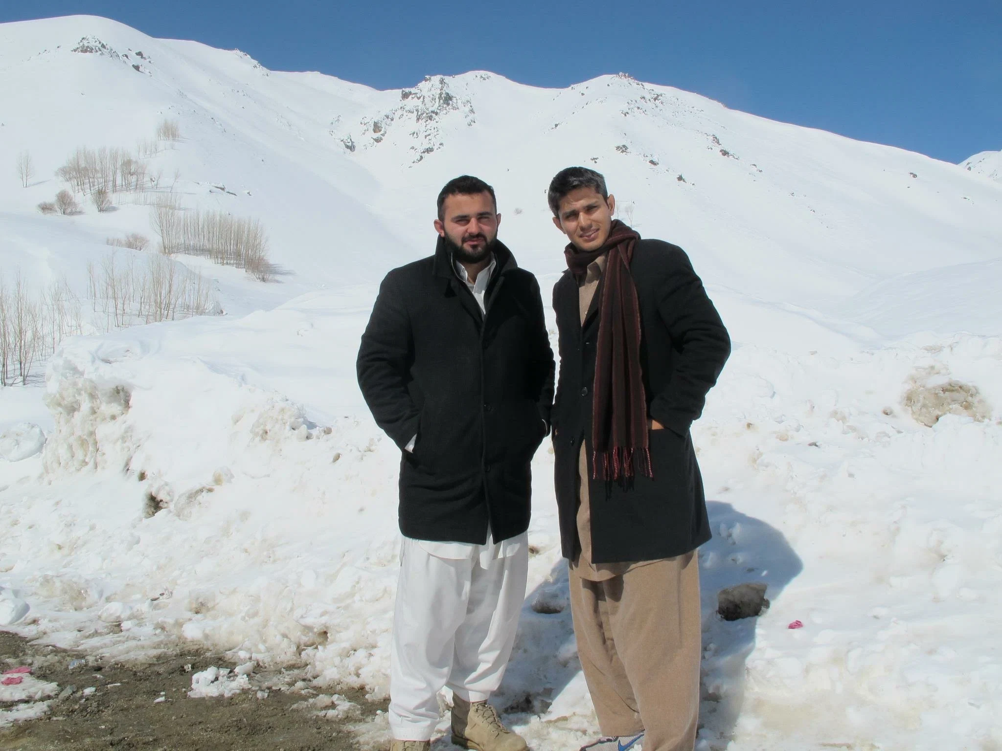 James and his brother exploring snowy mountains together